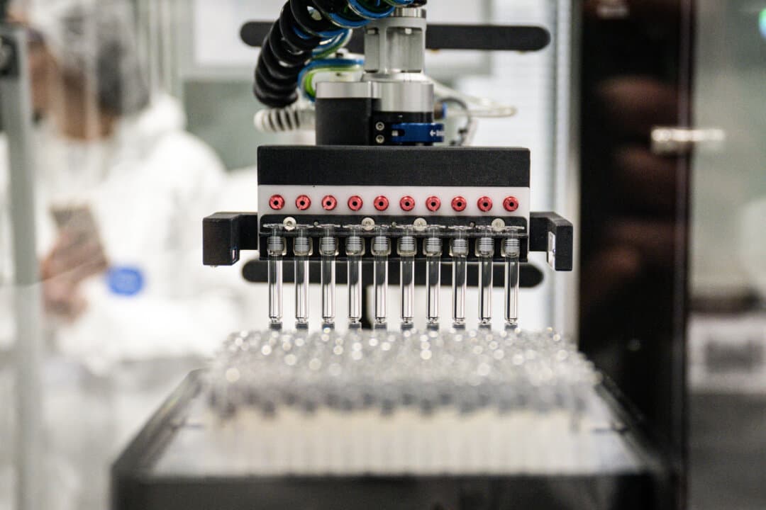 Tubes for medication syringes are seen on a production line during a press tour of French pharmaceutical group Sanofi’s biotechnology production facility in Le Trait, France, on Nov. 27, 2025. (Lou Benoist/AFP via Getty Images)