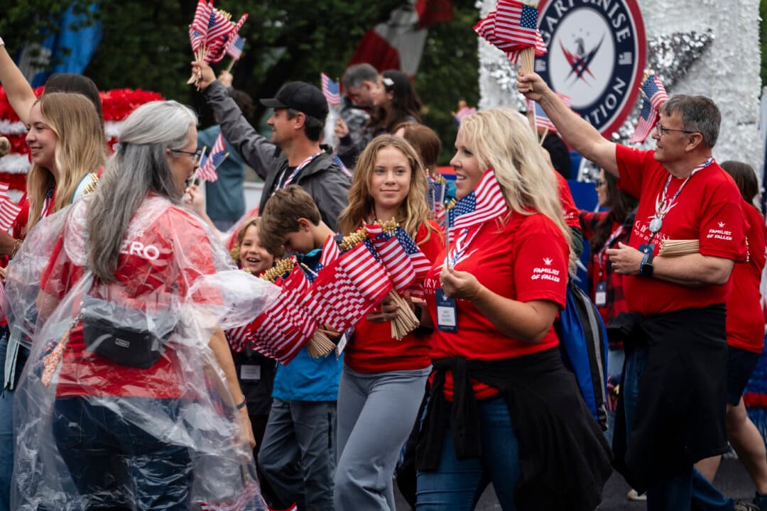 People take part in the National Memorial Day parade in Washington on May 25, 2026. (Madalina Kilroy/The Epoch Times)