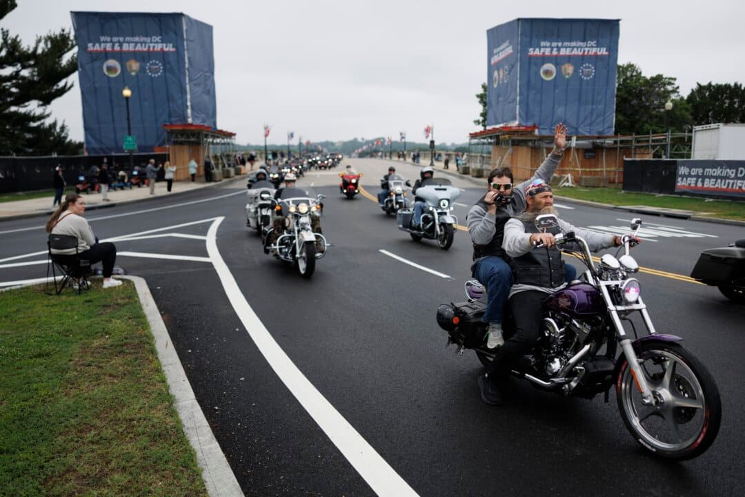 Motorcyclists ride in formation over the Arlington Memorial Bridge during the “Rolling to Remember” ride on Memorial Day weekend in Washington on May 24, 2026. The Rolling to Remember tradition has been active for 38 years, tracing its continuous history back to the first “Rolling Thunder” rally in 1988. (Tom Brenner/Getty Images)