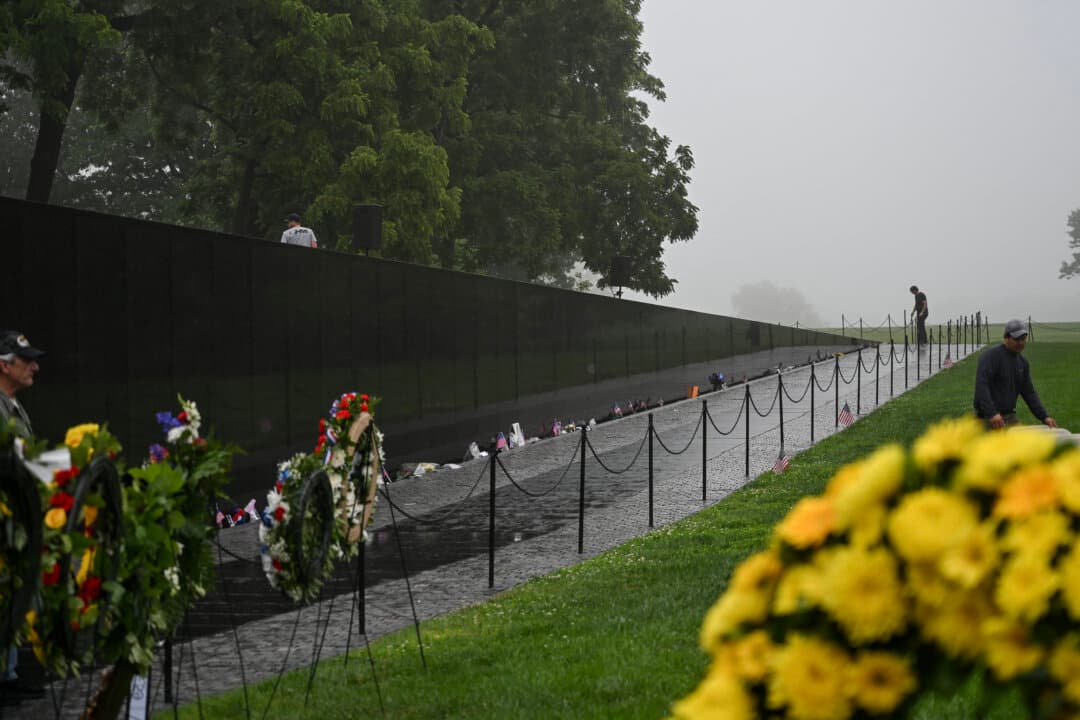 People visit the Vietnam Veterans Memorial on the morning of Memorial Day in Washington on May 25, 2026. (Alex Wroblewski/AFP via Getty Images)