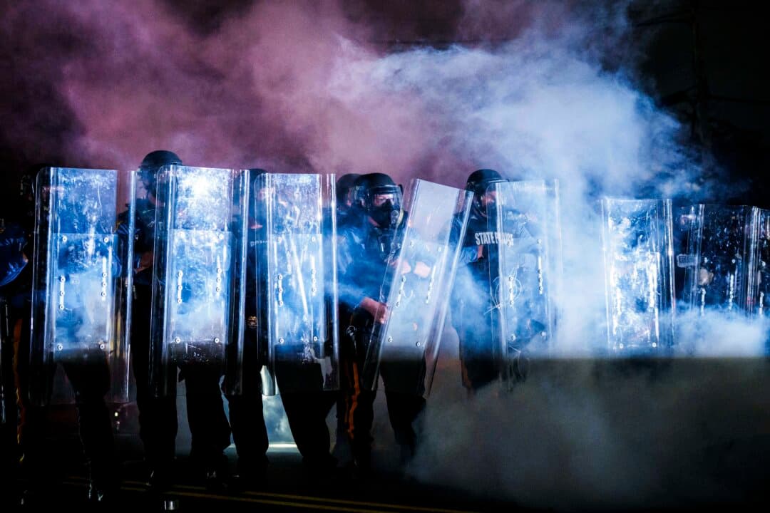 New Jersey State Police use tear gas as they clear protesters from outside of the federal immigration center at Delaney Hall where ICE is housing detained illegal immigrants in Newark, New Jersey, on May 29, 2026. (Adam Gray/Getty Images)