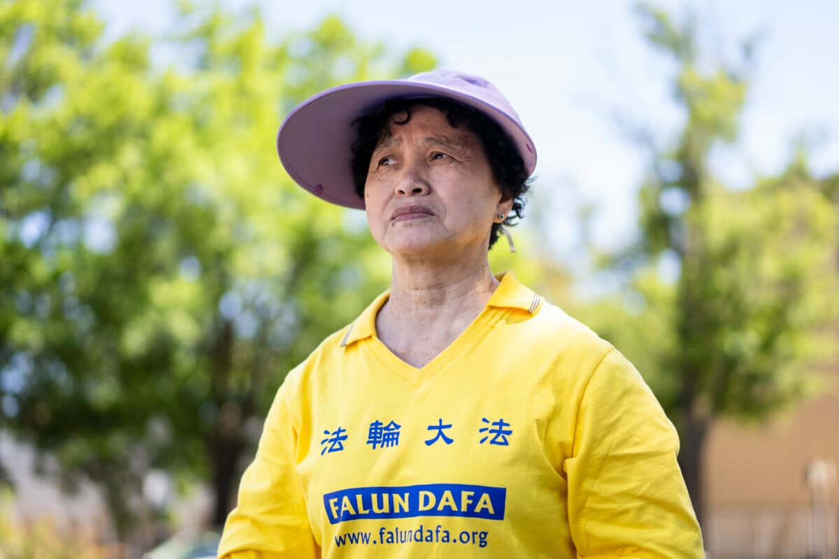 Tong Shuzhen stands in front of the Chinese Embassy in Washington on May 30, 2026. Tong's sister Tong Shuying has been detained since April in Wuhan, China, because of her faith. (Madalina Kilroy/The Epoch Times)