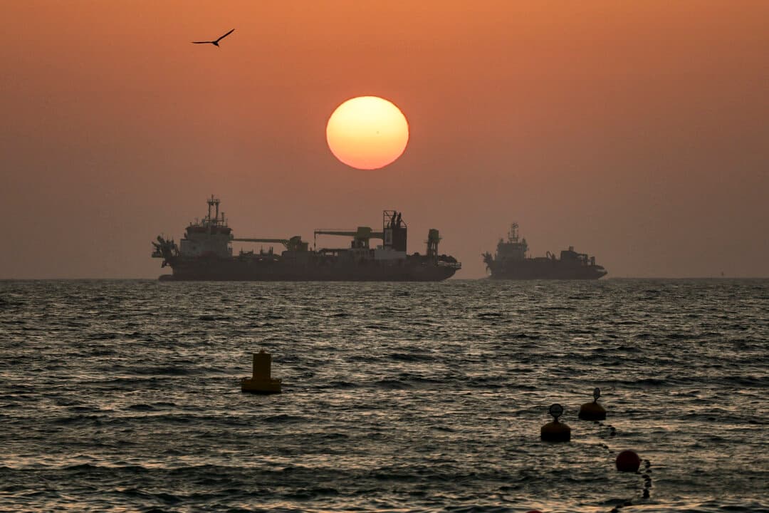The sun sets over vessels off the coast of Dubai on June 2, 2026. (Fadel Senna/AFP via Getty Images)