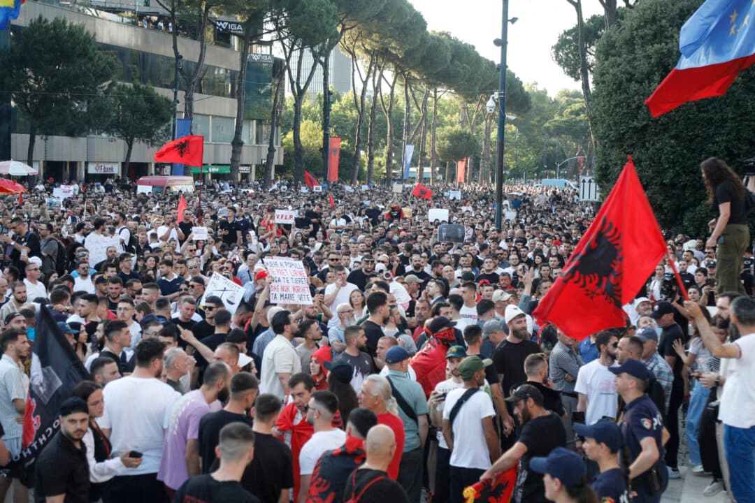Protestors take part in a demonstration in front of the prime minister’s office, against the construction of a luxury resort near a protected natural area in Tirana, Albania, on June 2, 2026. (AFP via Getty Images)