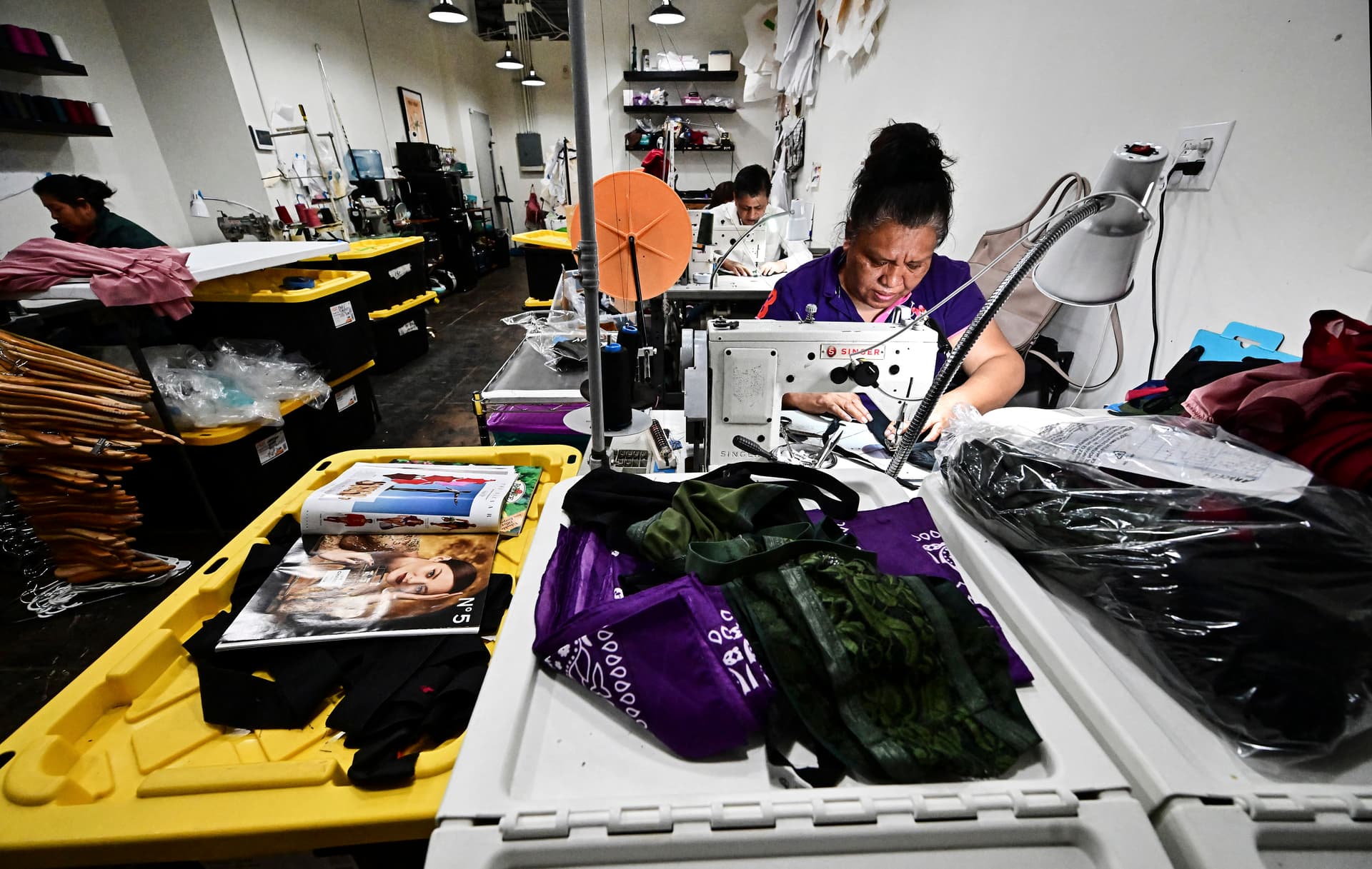 Seamstresses sew lingerie in the back room of a boutique store in Los Angeles, Calif., on April 18, 2025. (Frederic J. Brown / AFP, Getty Images)