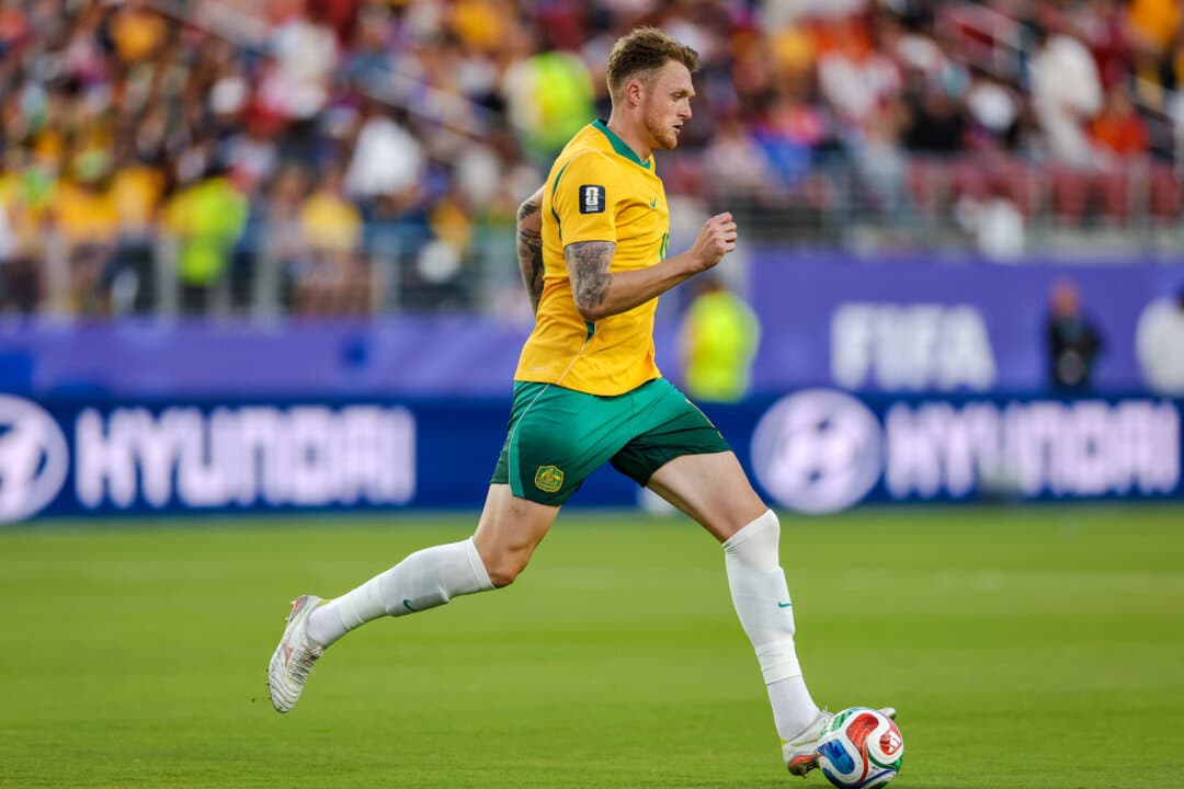 (Top Left) Désiré Doué (No. 20) of France participates in training a day ahead of the FIFA World Cup 2026 round of 32 match against Sweden at Melanie Lane Training Grounds in East Rutherford, N.J., on June 29, 2026. Doué chose to play for his native France, while his brother chose to play for their father’s native Ivory Coast. (Top Right) Guéla Doué of RC Strasbourg in action during a Union of European Football Associations Conference League match in Mainz, Germany, on April 9, 2026. He plays for his father's native Ivory Coast in the 2026 World Cup tournament, while his brother plays for France, where the brothers were born. (Bottom Left) John Souttar (No. 15) of Scotland passes the ball during an international friendly match between Scotland and Bolivia at Sports Illustrated Stadium in Harrison, N.J., on June 6, 2026. Souttar chose to play for his native Scotland while his brother chose Australia. (Bottom Right) Australian player Harry Souttar in action during the FIFA World Cup 2026 match against Paraguay at San Francisco Bay Area Stadium in Santa Clara, Calif., on June 25, 2026. Souttar and his brother were born in Scotland. (Buda Mendes/Getty Images, Christian Kaspar-Bartke/Getty Images, Adam Hunger/Getty Images, Stu Forster/Getty Images)