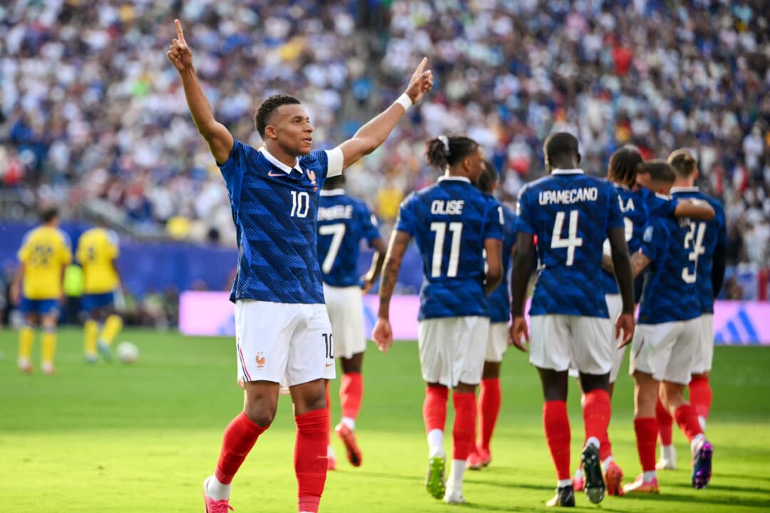 France's forward Kylian Mbappé (No. 10) celebrates scoring his team's third goal during the 2026 World Cup match against Sweden at the New York/New Jersey Stadium in East Rutherford, N.J., on June 30, 2026. Although his father is from Cameroon and his mother is Algerian, Mbappé considers himself a Frenchman. (Angela Weiss / AFP via Getty Images)