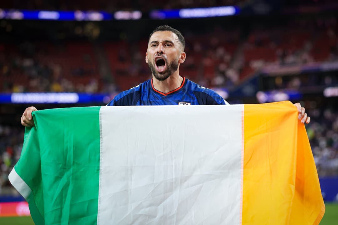 Roberto “Pico” Lopes (No. 4) of Cape Verde celebrates with an Irish flag after the 0–0 draw during the FIFA World Cup 2026 match against Saudi Arabia at Houston Stadium in Houston on June 26, 2026. Lopes was born in Ireland, but his father was from Cape Verde. (Francois Nel/Getty Images)