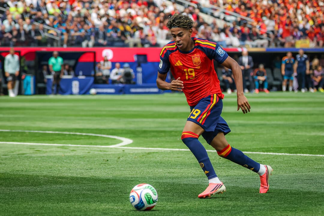 Spain's forward Lamine Yamal (No. 19) controls the ball during the 2026 World Cup match between Spain and Austria at the Los Angeles Stadium in Inglewood, Calif., on July 2, 2026. The 18-year-old could have played for his father’s native Morocco, but he chose to join the Rojas. (Etienne Laurent / AFP via Getty Images)