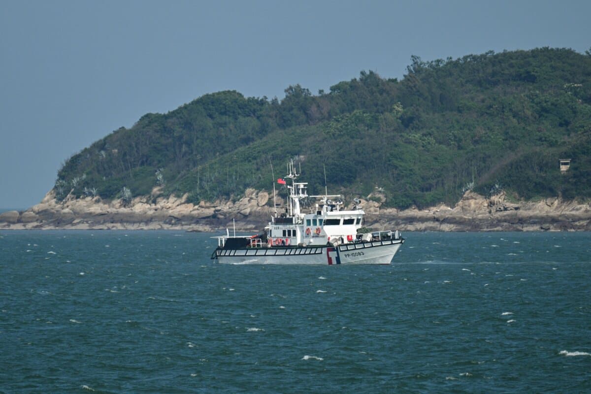 A Taiwanese coast guard boat patrols, as seen from a boat with Chinese tourists, to observe Taiwan's Kinmen Islands, off Xiamen, in China's southeastern Fujian Province on May 25, 2026. (Hector Retamal/ AFP via Getty Images)