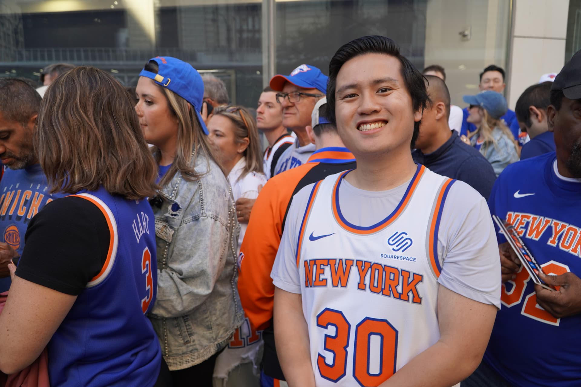 Brian Yan waits in line to get into the security perimeter around Madison Square Garden for Game 3 of the NBA Finals in New York on June 8, 2026. (Nicholas Zifcak/The Epoch Times)