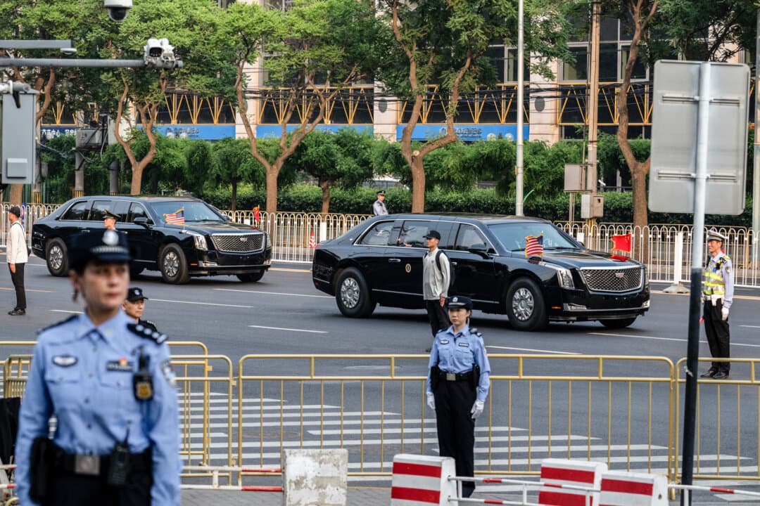 U.S. President Donald Trump's motorcade travels to a state dinner at the Great Hall of the People in Beijing on May 14, 2026. Last month's summit between Trump and Chinese leader Xi Jinping marked the first visit to China by a U.S. president since 2017. (Kevin Frayer/Getty Images)