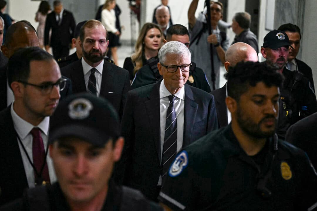 Microsoft co-founder Bill Gates (C) arrives for a closed-door interview with the House Oversight Committee on Capitol Hill in Washington, on June 10, 2026. Gates is set to face questioning from U.S. lawmakers over his relationship with convicted sex offender, the late Jeffrey Epstein. (Kent Nishimura/AFP via Getty Images)