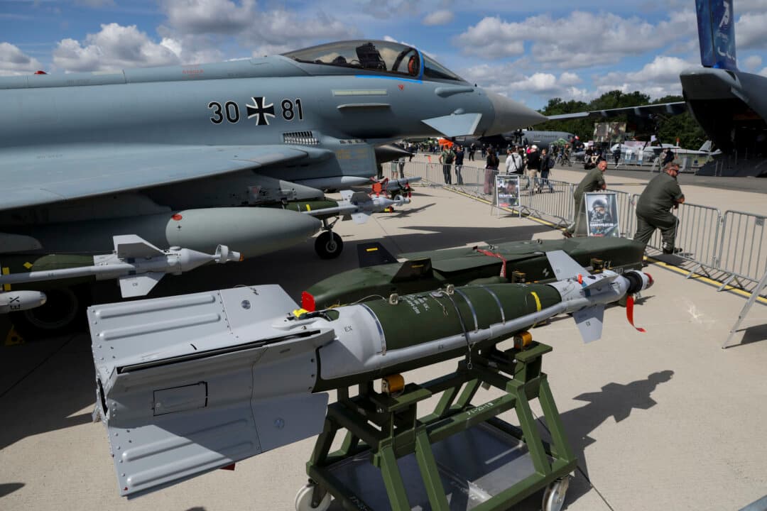 A Bundeswehr Eurofighter Typhoon multirole fighter jet stands on display with its weaponry at the 2026 ILA Berlin Air Show in Schoenefeld, Germany, on June 11, 2026. (Sean Gallup/Getty Images)
