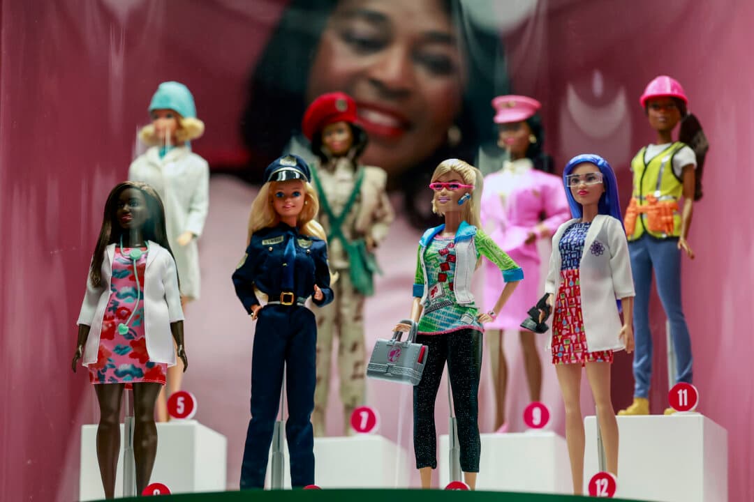 Mercy McDonald views exhibits at Barbie: The Exhibition at Kelvingrove Art Gallery in Glasgow, Scotland, on June 11, 2026. Making its Scottish debut, the exhibition features over 250 rare objects exploring the pop-culture icon's history. It traces the doll's evolution through rare archival material, fashions, and Dreamhouses, and has a dedicated section to the male doll, Ken. (Jeff J Mitchell/Getty Images)
