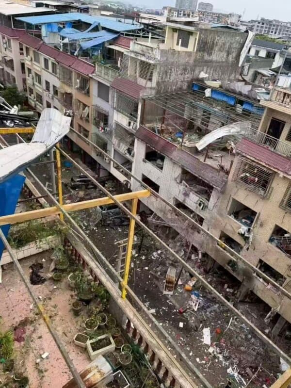 Damaged residential buildings near the site of an explosion on Lingxiang Road in Xing'an County, Guangxi Province, China, on June 11, 2026. (Provided to The Epoch Times by interviewee)
