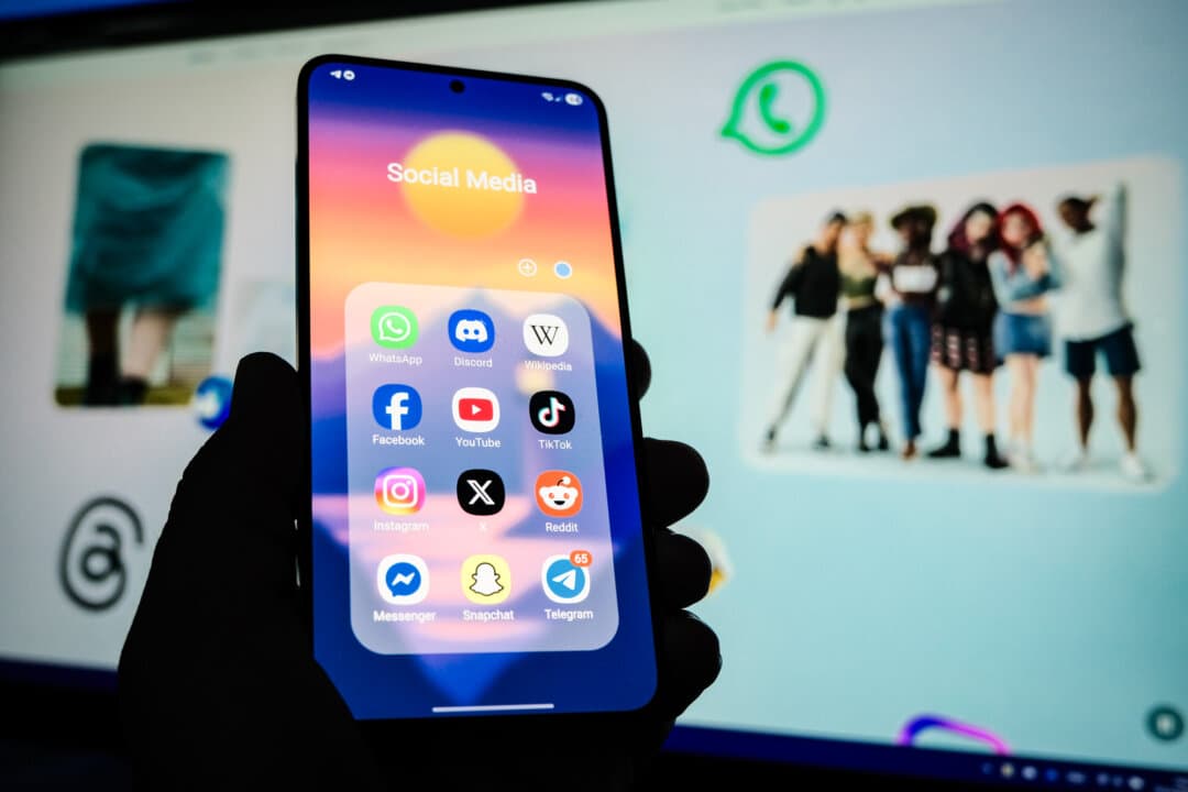 Social media app icons are displayed in this photo illustration on Oct. 18, 2025. Teen takeovers typically begin with announcements on platforms such as TikTok, Instagram, and Snapchat, and organizers are sometimes linked to multiple events. (Oleksii Pydsosonnii/The Epoch Times)