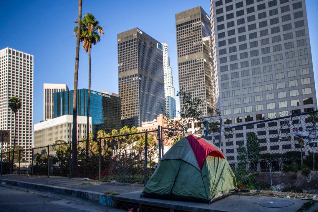 A homeless person's tent is seen in downtown Los Angeles on June 11, 2026, the eve of the World Cup opening match in the United States. America's second biggest city will host eight games in the World Cup but faces even bigger global scrutiny in 2028 when the Olympics come to town, bringing athletes and fans from all over the world. (Apu Gomes / AFP via Getty Images)