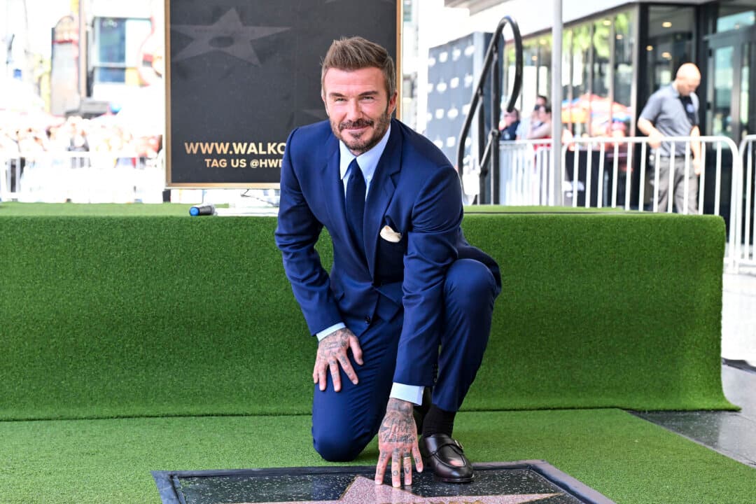 English former footballer David Beckham poses at his newly unveiled Hollywood Walk of Fame star during a ceremony in Hollywood, Calif., on June 12, 2026. (Lisa O'Connor / AFP via Getty Images)