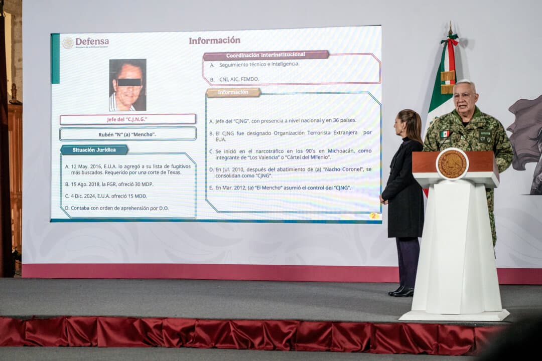 Mexican President Claudia Sheinbaum looks at the report presented by the Secretary of National Defense Ricardo Trevilla Trejo during the morning briefing at Palacio Nacional in Mexico City on Feb. 23, 2026. Mexican authorities confirmed the deaths of more than 25 members of the armed forces in different attacks by the Jalisco New Generation cartel after the operation that killed its leader, Nemesio Oseguera Cervantes, known as "El Mencho." (Cristopher Rogel Blanquet/Getty Images)