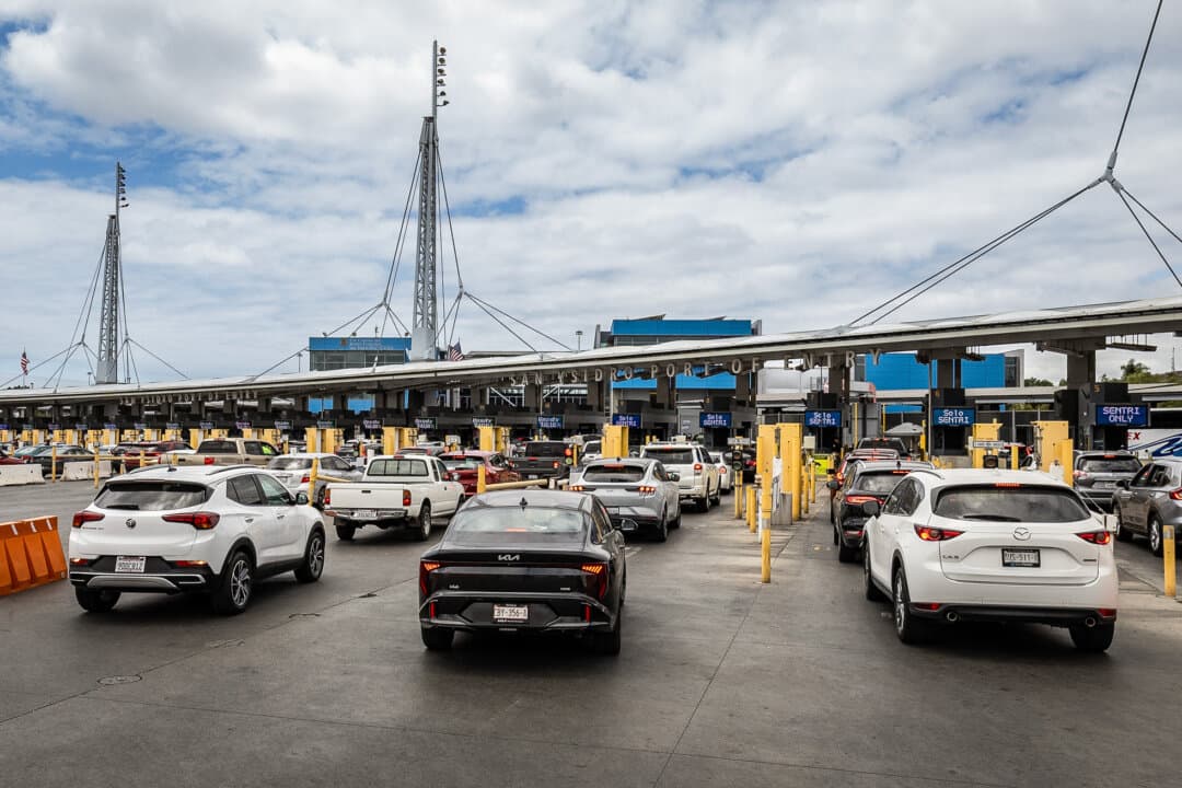 Vehicles cross from Mexico through the San Ysidro Port of Entry outside San Diego on May 26, 2026. Between 42,000 to 47,000 vehicles pass through the “world’s busiest border crossing” each day, according to Port Director Mariza Marin. (John Fredricks/The Epoch Times)