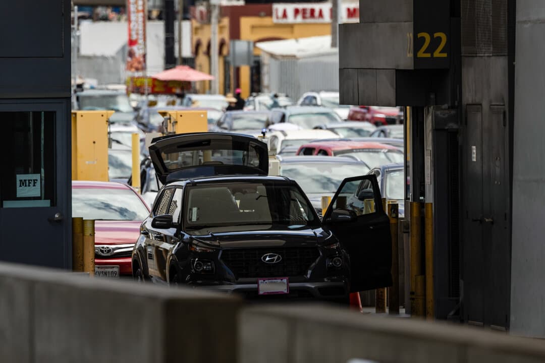 A vehicle undergoes inspection at the San Ysidro Port of Entry outside San Diego on May 26, 2026. Of the roughly 42,000 to 47,000 vehicles that cross daily, about 3 percent are referred for secondary inspections, where AI-assisted X-ray technology helps officers identify who and what is inside each vehicle. (John Fredricks/The Epoch Times)