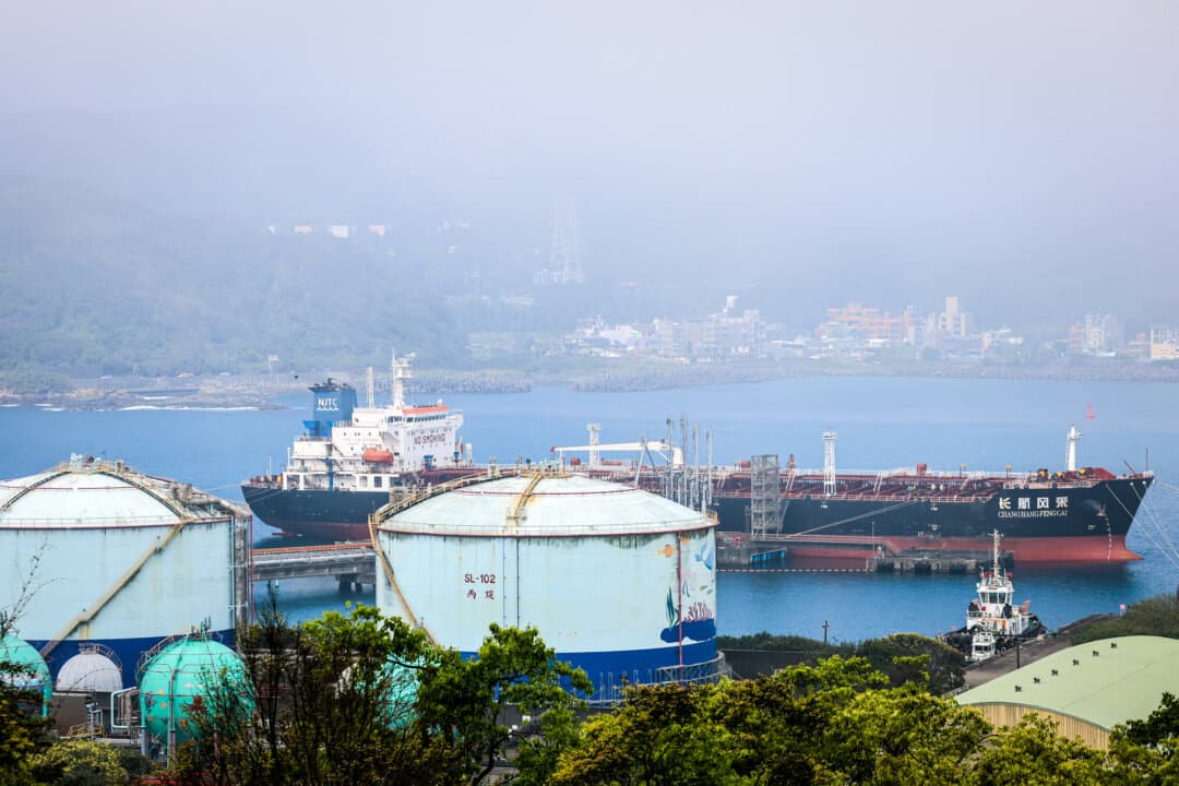 Oil products tanker Chang Hang Feng Cai, which is operated by a Chinese shipping company, is docked beside the liquefied petroleum gas supply and distribution service center area at Shen'ao Port in New Taipei City, Taiwan, on March 18, 2026. The West has hoped that by integrating China into the global trade system and helping the country get rich, political freedom would follow. That hasn't happened, Taiwan's Vice President told The Epoch Times. (I-Hwa Cheng / AFP via Getty Images)