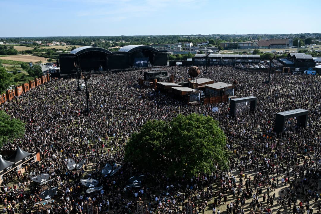Heavy metal fans enjoy a show during the 19th edition of Hellfest rock and heavy metal festival, in Clisson, France, on June 19, 2026. (Sebastien Salom-Gomis/AFP via Getty Images)