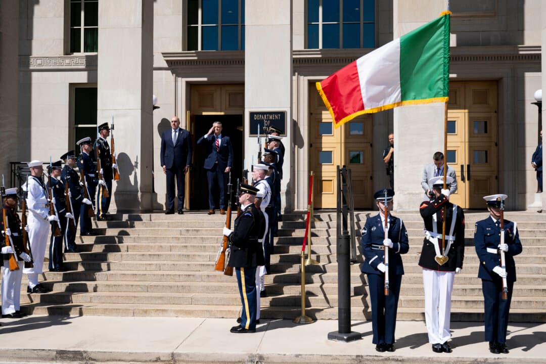U.S. Secretary of Defense Pete Hegseth and Italian Defense Minister Guido Crosetto (L), listen as national anthems are played during an honor cordon welcoming ceremony at the Pentagon in Washington, on June 15, 2026. (Saul Loeb/AFP via Getty Images)