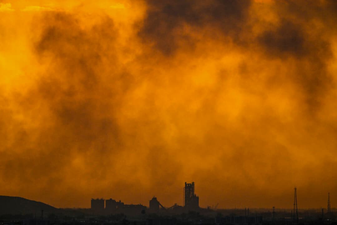 Smoke rises from a wildfire in west Miami-Dade County near Miami, Fla., on June 16, 2026. Crews are battling the Quarry 2 wildfire, which broke out a day earlier, and has burned about 3,500 acres and was 20 percent contained, according to Florida's Active Wildfire Points Map. (Chandan Khanna/AFP via Getty Images)