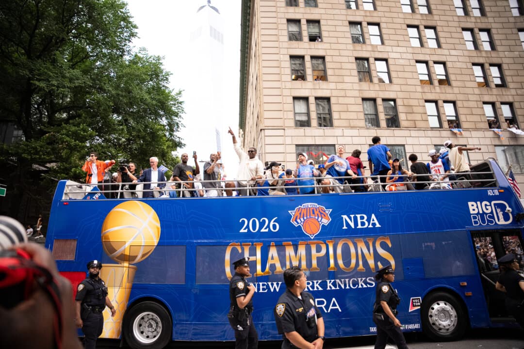 The New York Knicks Championship ticker tape parade in New York City, on June 18, 2026. The New York Knicks defeated the San Antonio Spurs to win their first NBA Championship in 53 years. (Larry Dye/The Epoch Times)