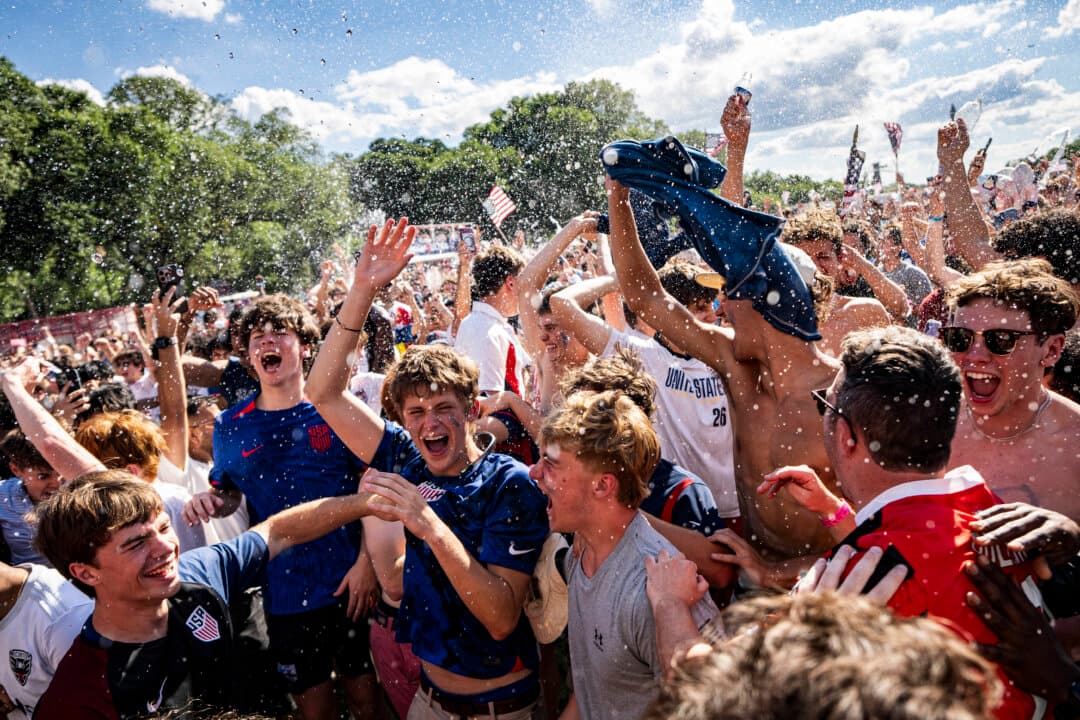 United States soccer fans celebrate their victory following the FIFA World Cup 2026 Group D match between the United States and Australia at the FIFA Fan Zone on the National Mall in Washington on June 19, 2026. The FIFA World Cup 2026 Fan Zone is set up as part of America's 250th anniversary celebration and will host daily matches blocks from the U.S. Capitol Building. (Al Drago/Getty Images)