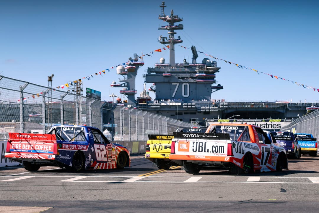 Kaz Grala, driver of the No. 62 Fire Dept. Coffee Toyota, and Giovanni Ruggiero, driver of the No. 17 JBL Toyota, race during the NASCAR Craftsman Truck Series Navy 250 at Naval Base Coronado in San Diego, on June 19, 2026. (David Jensen/Getty Images)