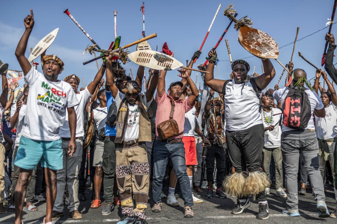 Protesters in traditional Zulu attire participate in a protest by members of the March and March Movement in Umlazi township south-west of Durban, South Africa, on June 22, 2026. The country has been on edge following weeks of sometimes violent xenophobic unrest that has left at least two people dead. (Rajesh Jantilal/AFP via Getty Images)