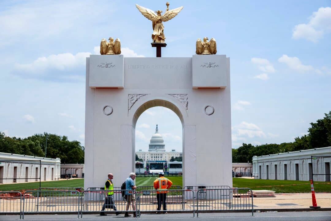 A scale replica of President Donald Trump's 250-foot-tall “Triumphal Arch” stands in the middle of the National Mall along 7th Street Northwest in Washington, on June 22, 2026. The display is part of Trump's Freedom 250 Great American State Fair, which will fill the mall with 150 exhibits from all 56 states and territories from June 25 to July 10. (Chip Somodevilla/Getty Images)