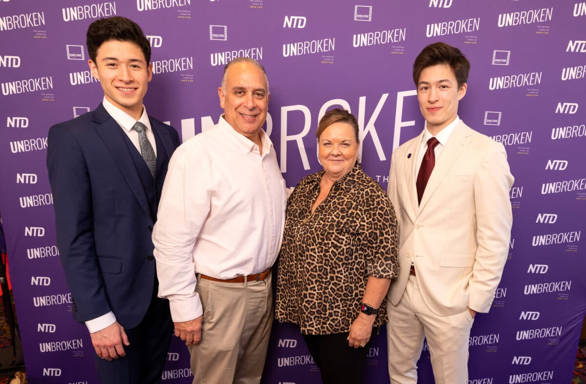 (L–R) Shen Yun dancer Lucas Browde, attorney Mark Armijo and his wife, and Shen Yun dancer Jesse Browde at the Orange County premiere of documentary "UNBROKEN: The Untold Story of Shen Yun" in Newport Beach, Calif., on June 18, 2026. (John Fredricks/The Epoch Times)