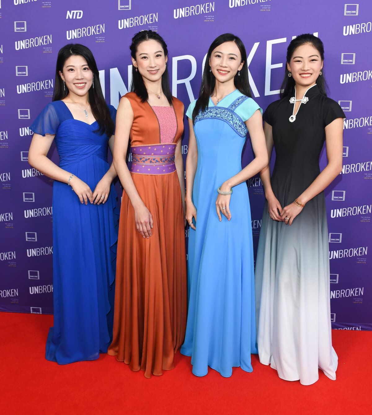 (L–R) Shen Yun violist Rachel Chen and Shen Yun dancers Angela Lin, Bella Fan, and Shindy Cai at the Los Angeles premiere of documentary "UNBROKEN: The Untold Story of Shen Yun" at AMC The Grove 14 in Los Angeles on June 17, 2026. (Courtesy of Amy Graves for UNBROKEN)