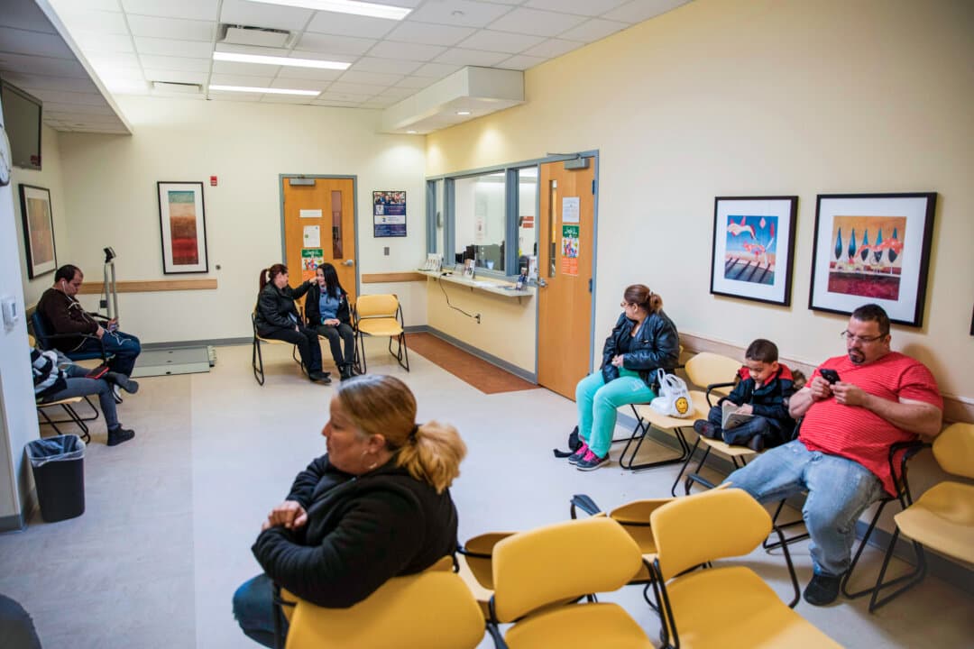 Patients sit in a waiting room at a health clinic in Philadelphia on March 13, 2017. Medicaid, which provides health coverage to low-income and disabled Americans, is increasingly targeted by criminals, the Justice Department said. (Dominick Reuters/AFP/Getty Images)