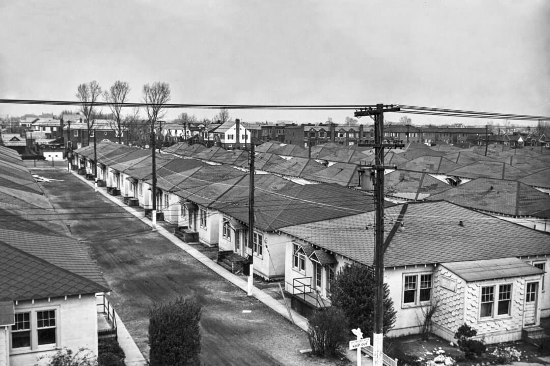 Houses line sidewalks in the Manhattan Beach neighborhood of Brooklyn, N.Y., circa 1945. Formerly occupied by the U.S. Coast Guard, the properties were turned over to veterans to ease the city's post-war housing shortage. The national homeownership rate rose to 55 percent by 1950. (European/FPG/Archive Photos/Getty Images)