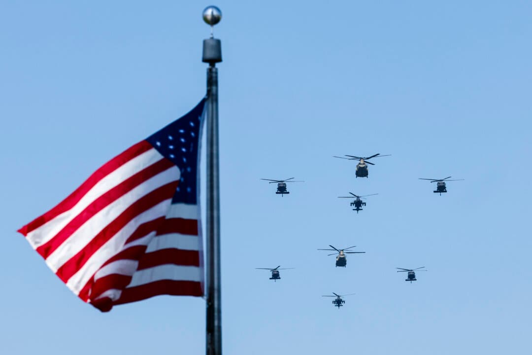 Army helicopters fly past the Washington Monument during pre-Fourth of July festivities on the National Mall in Washington on July 3, 2026. Fourth of July festivities have been shortened, and some are facing cancellations amid an extreme, multi-day heat wave bringing triple-digit temperatures to much of the eastern United States. (Finn Gomez/Getty Images)
