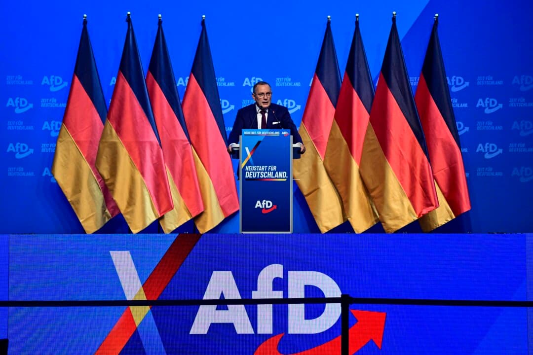 Alternative for Germany (AfD) co-leader Tino Chrupalla addresses delegates at the AfD party congress at the Messe Erfurt fairground in Erfurt, eastern Germany, on July 4, 2026. (John Macdougall/AFP via Getty Images)
