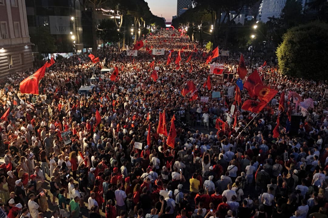 Protesters demonstrate against the construction of a luxury resort near a protected natural area in central Tirana, Albania, on July 4, 2026. (Adnan Beci/AFP via Getty Images)