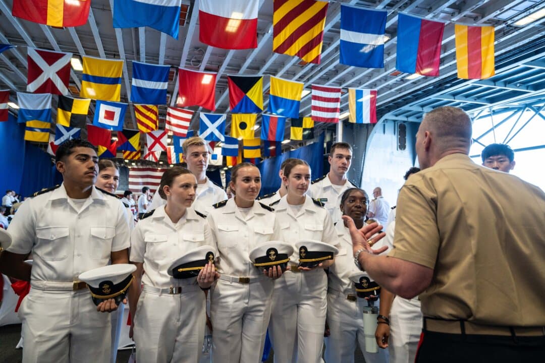 Naval officers and sailors on the USS Kearsarge ahead of the International Naval Review 250 in New York City on July 4, 2026. (Samira Bouaou/The Epoch Times)