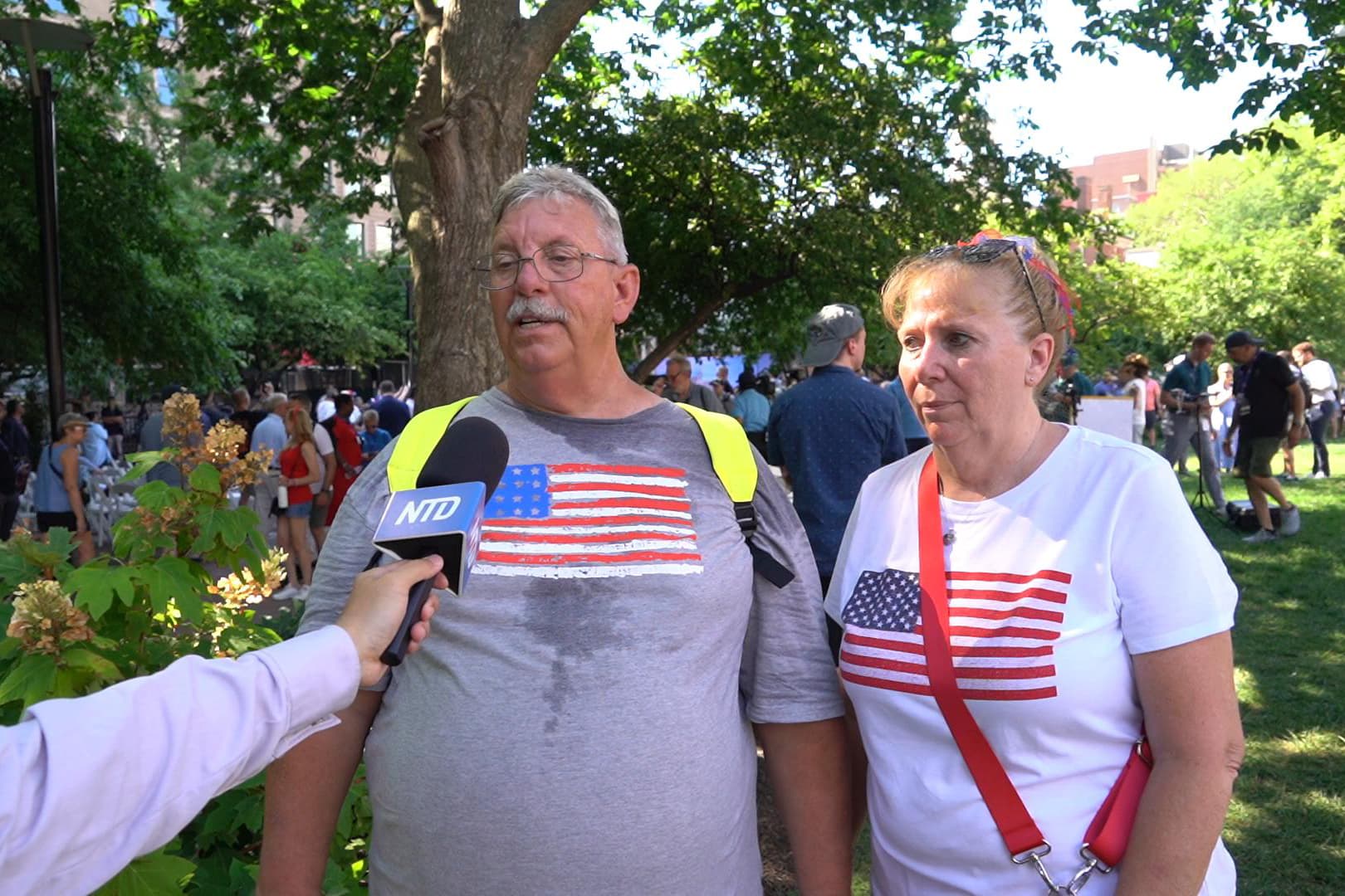 Blaine and Julie Dowell, who traveled from Texas, attended the ceremony burying the United States’ Semiquincentennial time capsule held on the lawn at Independence Hall on July 4, 2026. (William Huang /The Epoch Times)