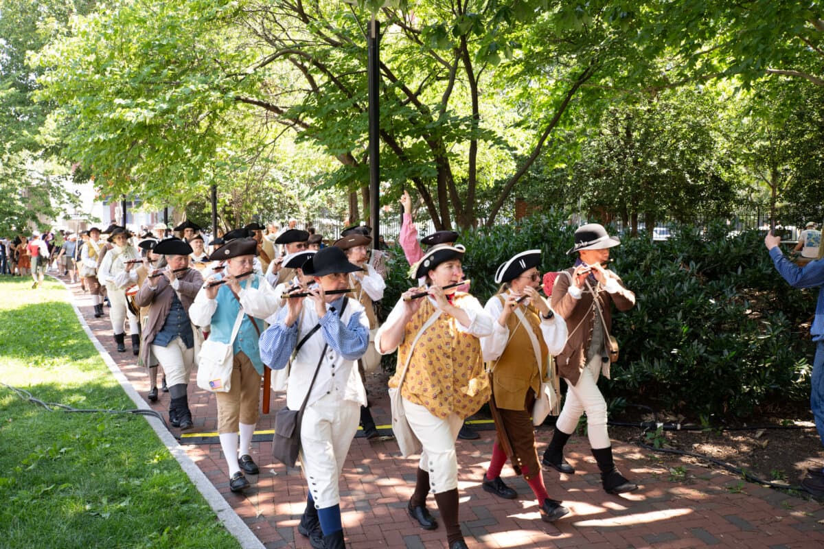 Performers participate in the festivities around Philadelphia Independence Mall, to celebrate America's 250th anniversary, on July 3, 2026. (Larry Dye/The Epoch Times)