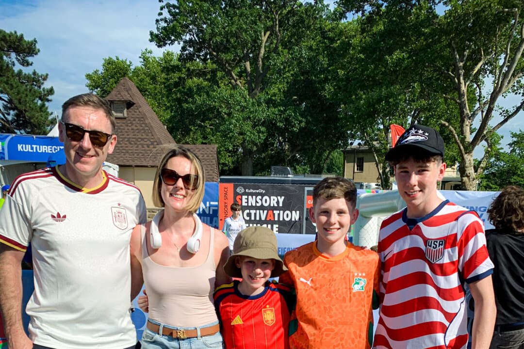 (L–R) Paul, Clare, Patrick, Oliver, and Rory Prenter talk about their U.S. visit after a small-sided game of soccer at the FIFA Fan Festival in Philadelphia, on June 30, 2026. Rory and Oliver currently compete for their native Northern Ireland at the academy level. (Aaron Gifford/The Epoch Times)