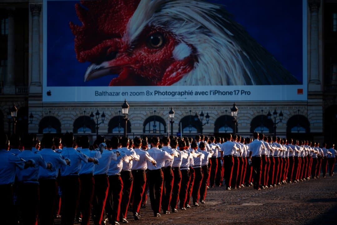 French Ecole Polytechnique members parade during a rehearsal of the annual Bastille Day military parade down the Champs-Elysees Avenue in Paris on July 8, 2026. (Dimitar Dilkoff/AFP via Getty Images)