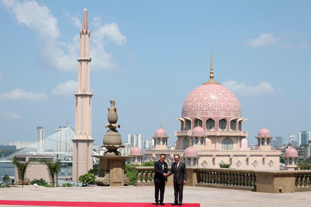 Thailand's Prime Minister Anutin Charnvirakul with Malaysian Prime Minister Anwar Ibrahim during Charnvirakul's official visit at the federal government office in Putrajaya, Malaysia, on July 9, 2026. (Hasnoor Hussain/Pool/AFP via Getty Images)