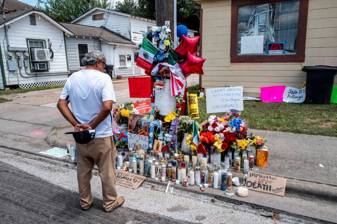 A man pays his respects at the site where Mexican immigrant Lorenzo Salgado Araujo was killed in Houston, on July 9, 2026. An Immigration and Customs Enforcement officer fatally shot Salgado during an attempted traffic stop arrest on July 7. (Brandon Bell/Getty Images)