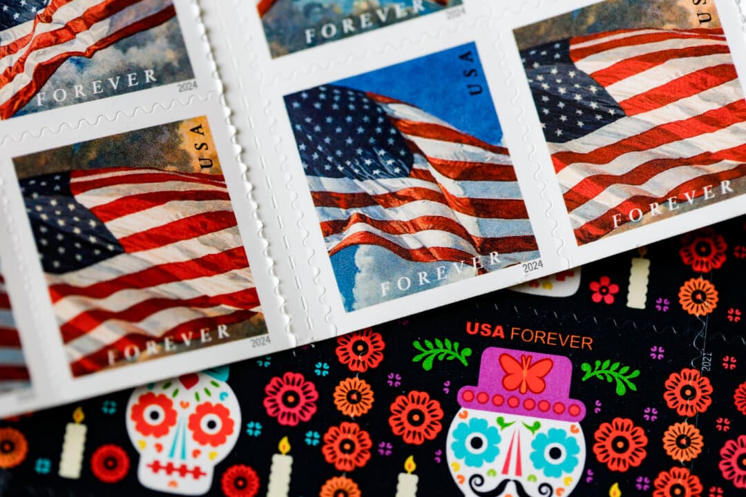 U.S. Postal Service forever stamps are displayed in Los Angeles on July 9, 2026. The Postal Service will raise the price of a First-Class Forever stamp from 78 cents to 82 cents beginning July 12, while rates for postcards and international mail will also increase as the agency seeks to improve its financial position under its long-term modernization plan. (Justin Sullivan/Getty Images)